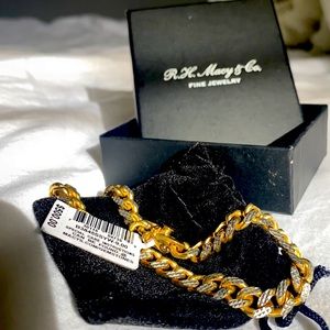 R.H. Macy’s & Co 18k gold Cuban cut bracelet.